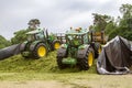 John Deere tractor pushing silage at the clamp