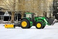 John Deere Tractor Removing Snow with Front End Loader and Rear Blade