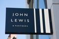 The John Lewis sign hanging on a shop in the United Kingdom