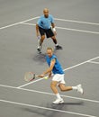 John McEnroe and James Blake in actions