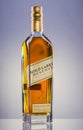 Johnnie Walker Gold Label blended whisky on gradient background