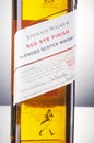 Johnnie Walker red rye finish blended whisky on gradient background.