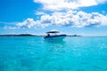 JOHNNY CAY, COLOMBIA - OCTOBER 21, 2017: Amazing beautiful view of a man sailing in a boat in an gorgeos blue water,San