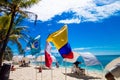 JOHNNY CAY, COLOMBIA - OCTOBER 21, 2017: Unidentified people sitting a chair in the beach and enjoying the beautiful