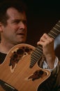 Johnny Clegg performing on stage Royalty Free Stock Photo
