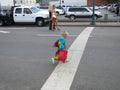 Blue Plum Festival - Child Crossing Street