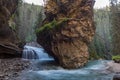 Johnston Canyon cave in Spring season with waterfalls, Johnston Canyon Trail, Alberta, Canada Royalty Free Stock Photo