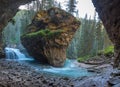 Johnston Canyon cave in Spring season with waterfalls, Johnston Canyon Trail, Alberta, Canada Royalty Free Stock Photo