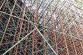 Metal scaffolding is used as a temporary structure that supports works at the construction site.