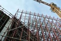 Metal scaffolding is used as a temporary structure that supports works at the construction site.