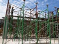 Metal scaffolding is used as a temporary structure that supports works at the construction site.