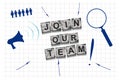 Join Our Team. Concept with words on stone blocks, and different icons, on a white sheet. Magnifying glass, arrows