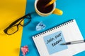 Join our team - message at blue note near morning coffee cup at blue and yellow background. Hiring and new job concept Royalty Free Stock Photo