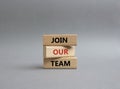 Join our team symbol. Wooden blocks with words Join our team. Beautiful grey background. Business and Join our team concept. Copy Royalty Free Stock Photo