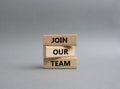 Join our team symbol. Wooden blocks with words Join our team. Beautiful grey background. Business and Join our team concept. Copy Royalty Free Stock Photo