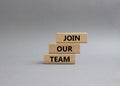 Join our team symbol. Wooden blocks with words Join our team. Beautiful grey background. Business and Join our team concept. Copy Royalty Free Stock Photo