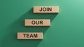 Join our team symbol. Wooden blocks with words Join our team.Business and Join our team concept.