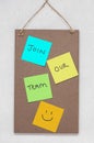 Join our team, text written on colourful sticky notes on a wooden noticeboard