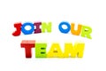 Join Our Team text written with colourful wooden letters, over white with copy space Royalty Free Stock Photo