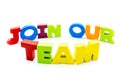 Join Our Team text written with colourful wooden letters, over white with copy space Royalty Free Stock Photo