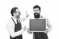 Join us. Hiring restaurant staff. Men bearded informing. Men bearded bartender in apron hold blank chalkboard. Bartender