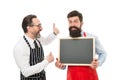 Join us. Hiring restaurant staff. Men bearded informing. Men bearded bartender in apron hold blank chalkboard. Bartender