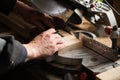 Joiner working on a machine with a circulation saw