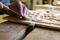 Joiner working on a piece of wood Royalty Free Stock Photo