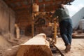 Joiner works on woodworking machine, lumbering