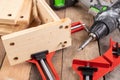 Joining wood using a carpentry clamp. Small carpentry work