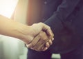 Joint Hands of Two Businessmen After Negotiating a Successful Business Agreement.