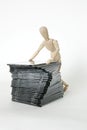 Jointed doll with cd stack Royalty Free Stock Photo