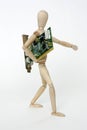 Jointed doll with computer circuit board Royalty Free Stock Photo