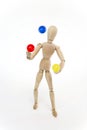 Jointed doll juggling with balls