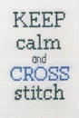 Joke inscription embroidered handmade. Keep calm and cross stitch. Royalty Free Stock Photo