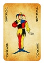 Joker Vintage playing card - isolated on white Royalty Free Stock Photo