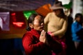 Jokhang Temple and Barkhor Square praying woman Lhasa Tibet