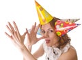 Joking woman in party hats Royalty Free Stock Photo