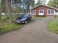 Jokkmokk, Norrbotten, Sweden, Agust 17, 2021: View of red wooden cabins at Arctic Camp Jokkmokk camping site.