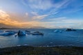Jokulsarlon Glacial Lagoon with floating blue iceberg, Iceland