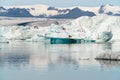 Jokulsarlon glacier lagoon bay with blue icebergs floating on st Royalty Free Stock Photo