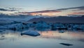 Jokulsarlon, glacier lagoon in Iceland at night with ice floating in water. Royalty Free Stock Photo