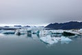 Jokulsarlon glacier lagoon, Iceland at sunset. Beautiful glaciers flow through the mountains. Cold landscape picture of icelandic Royalty Free Stock Photo