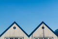 JOKULSARLON, ICELAND - AUGUST 2018: triangular rooftops of Icelandic detached houses Royalty Free Stock Photo