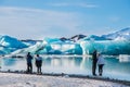 Tourists having a fun day at the jokulsarlon glacier lagoon tourist destination