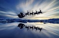 Jokulsarlon is a large glacial lake in Iceland, silhouette of Santa's reindeer