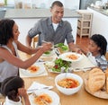 Jolly family dining together