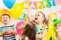 Jolly kids group celebrating birthday party