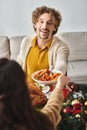 jolly man surrounded by his family