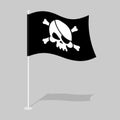 Jolly Roger. pirateÃÂ flag. Skull and Bones. skeleton head. growing black banner. Sign filibusters Royalty Free Stock Photo